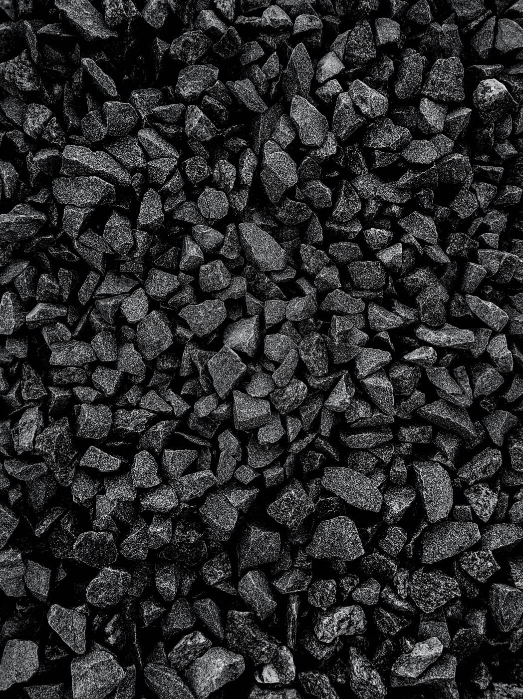 pattern a black and white photo of a pile of rocks mobile photography picture