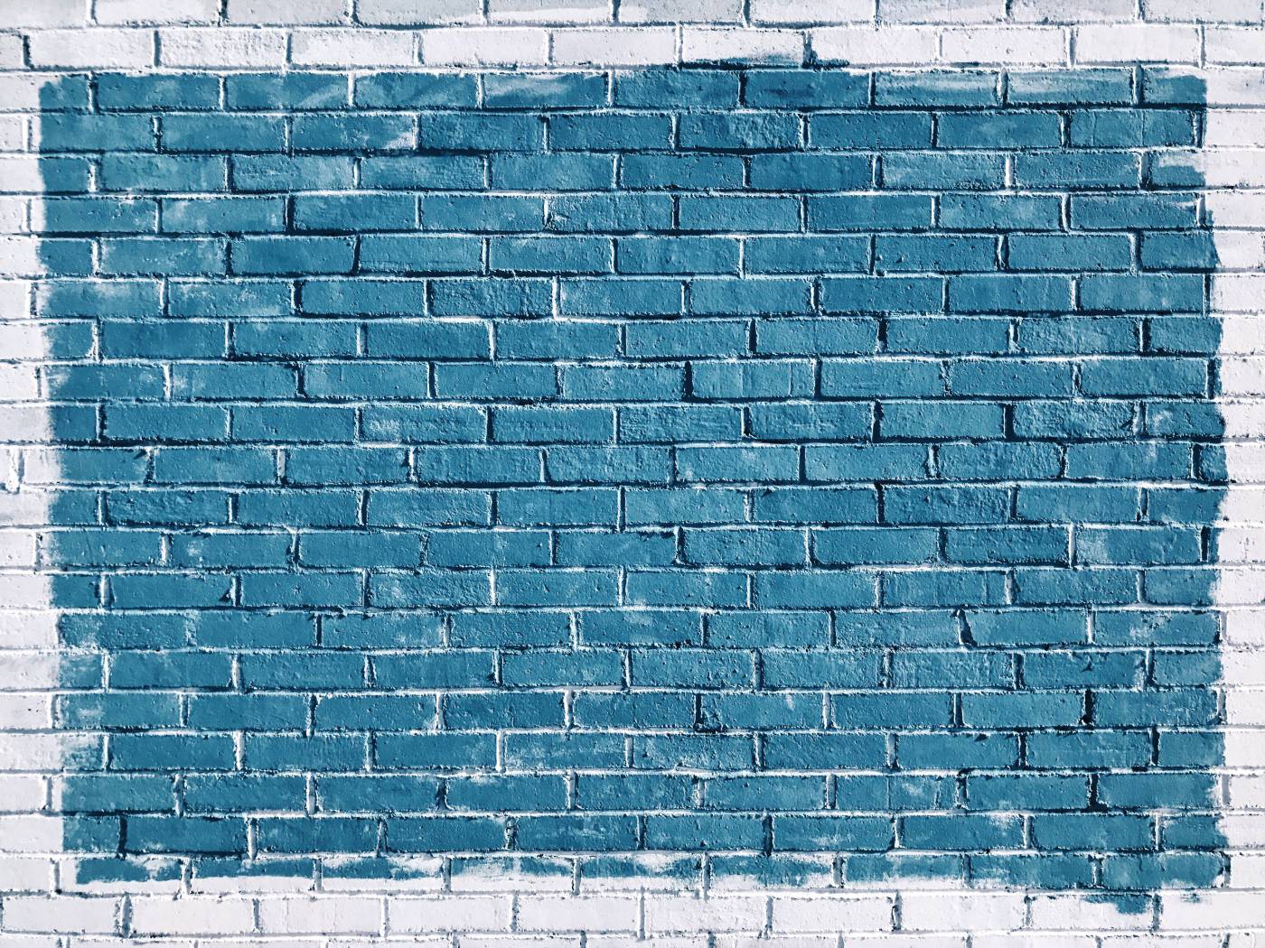background gray concrete bricks painted in blue blue picture