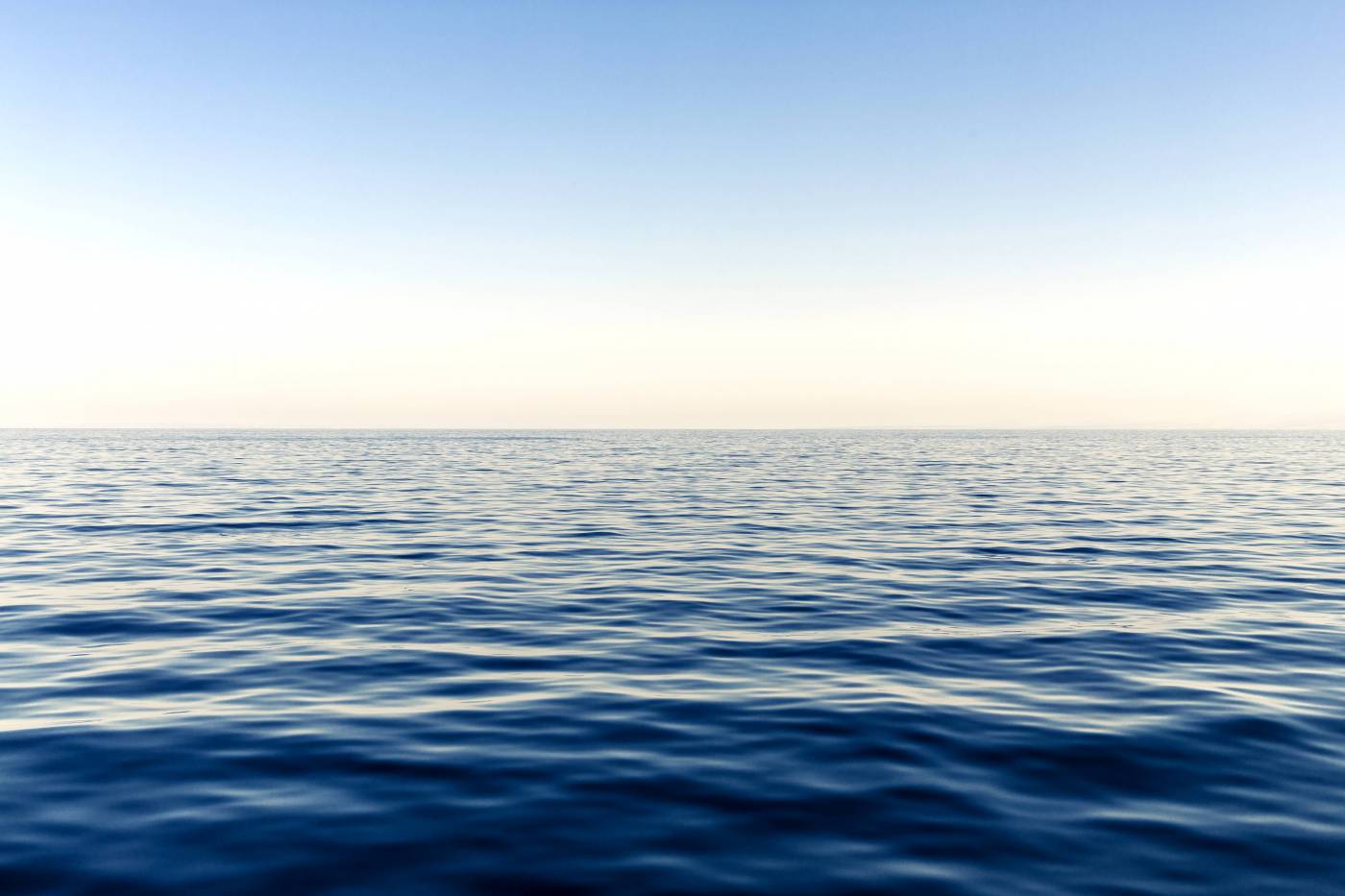  blue ocean water during daytime  picture
