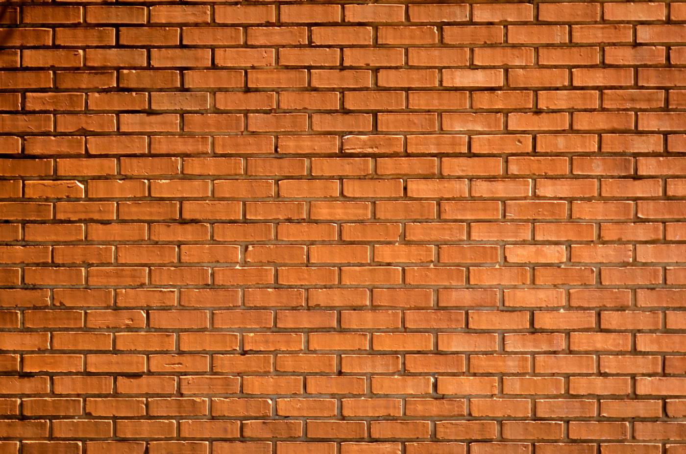 brown closeup photography of brown brick wall wall picture