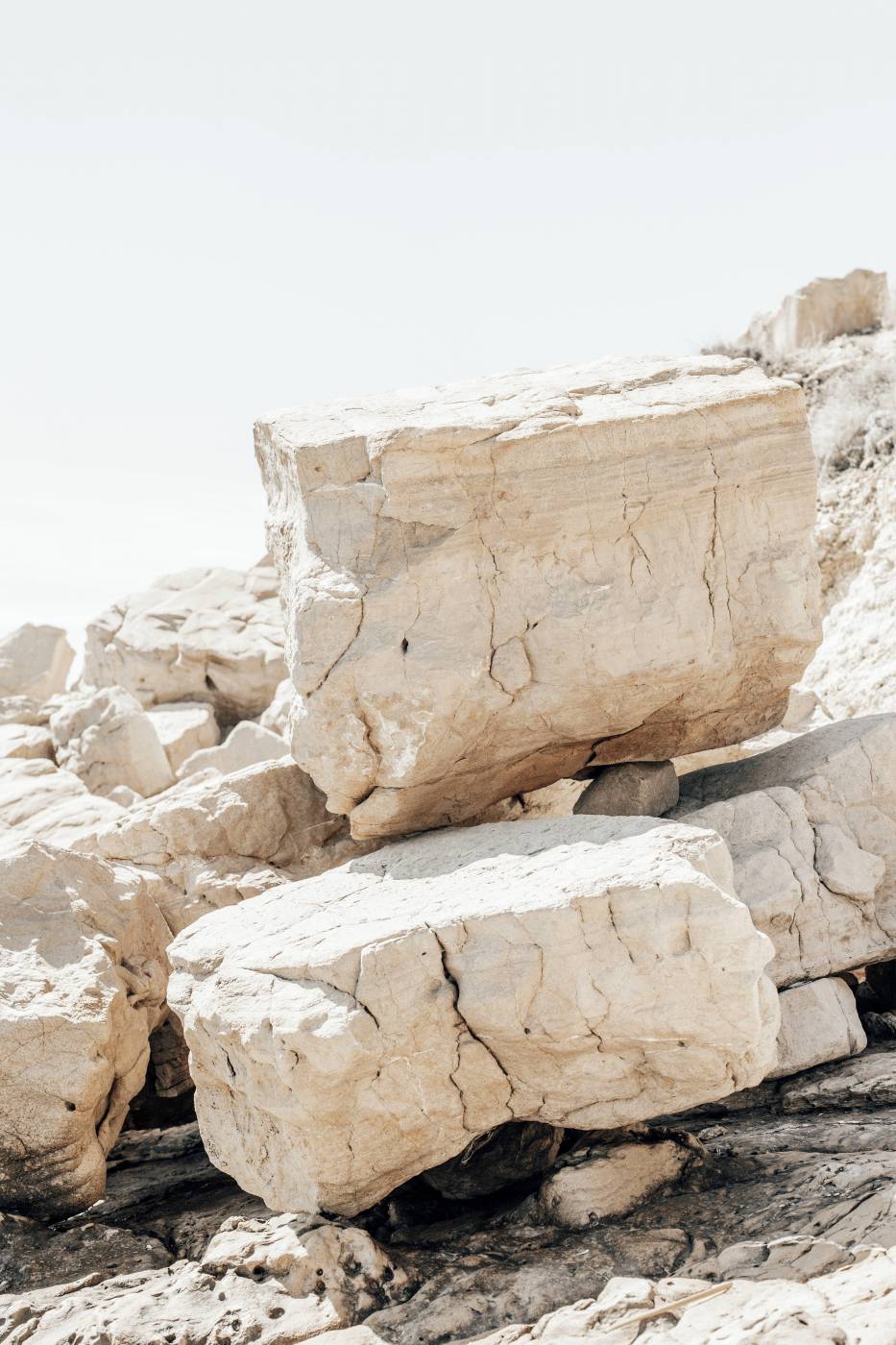  brown rock formation under white sky during daytime  picture