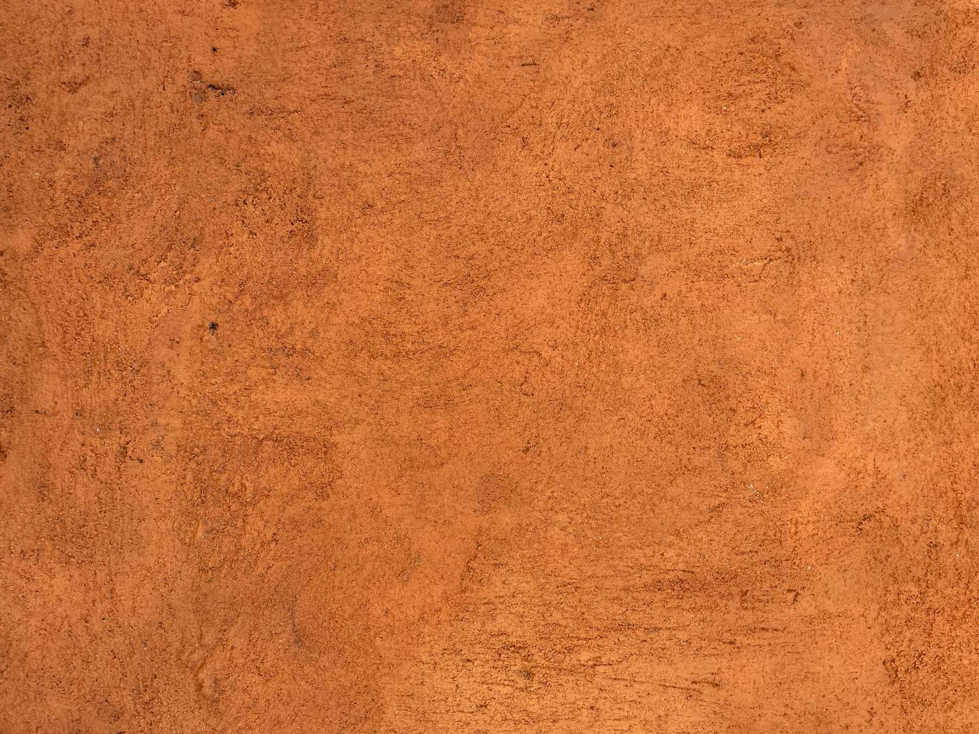 color person in black shoes standing on brown floor orange picture