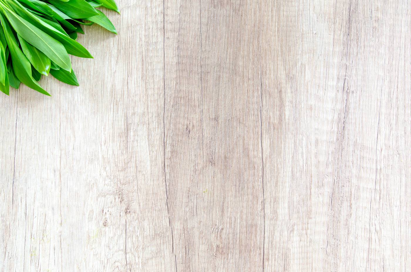  green leafed vegetable on brown wooden surface  picture