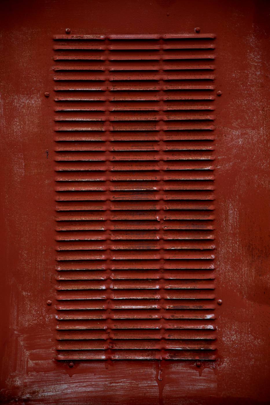  red metal tool box on red surface  picture