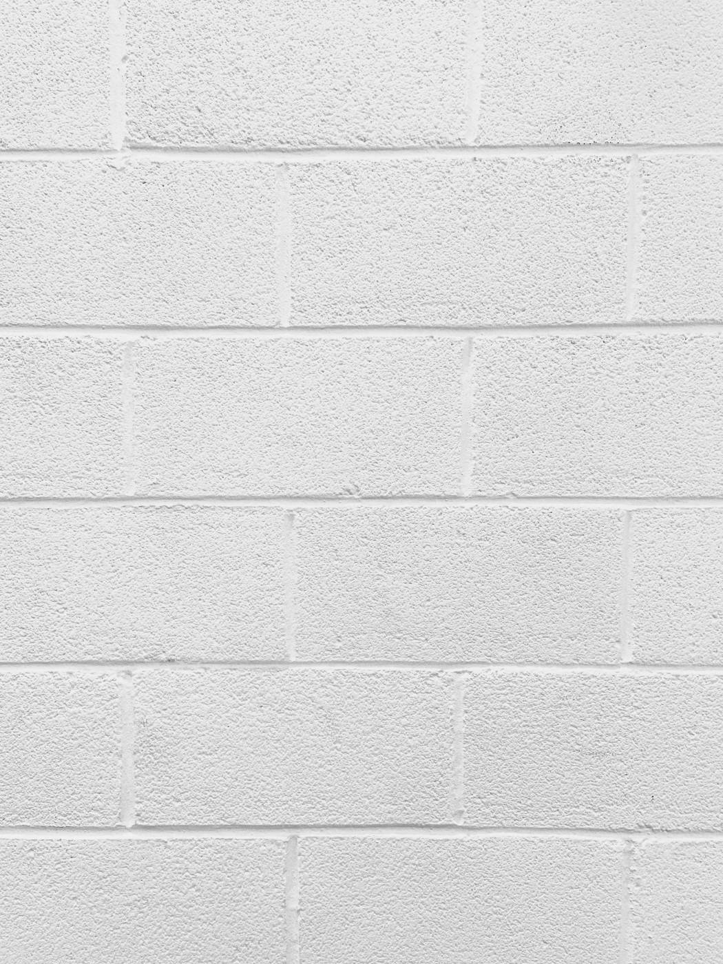  white concrete wall during daytime  picture