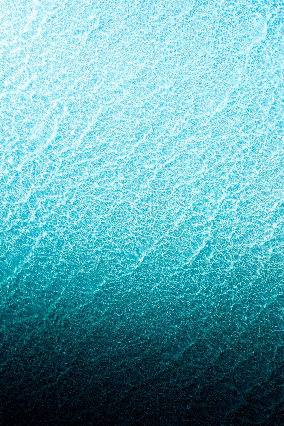  blue body of water during daytime  picture