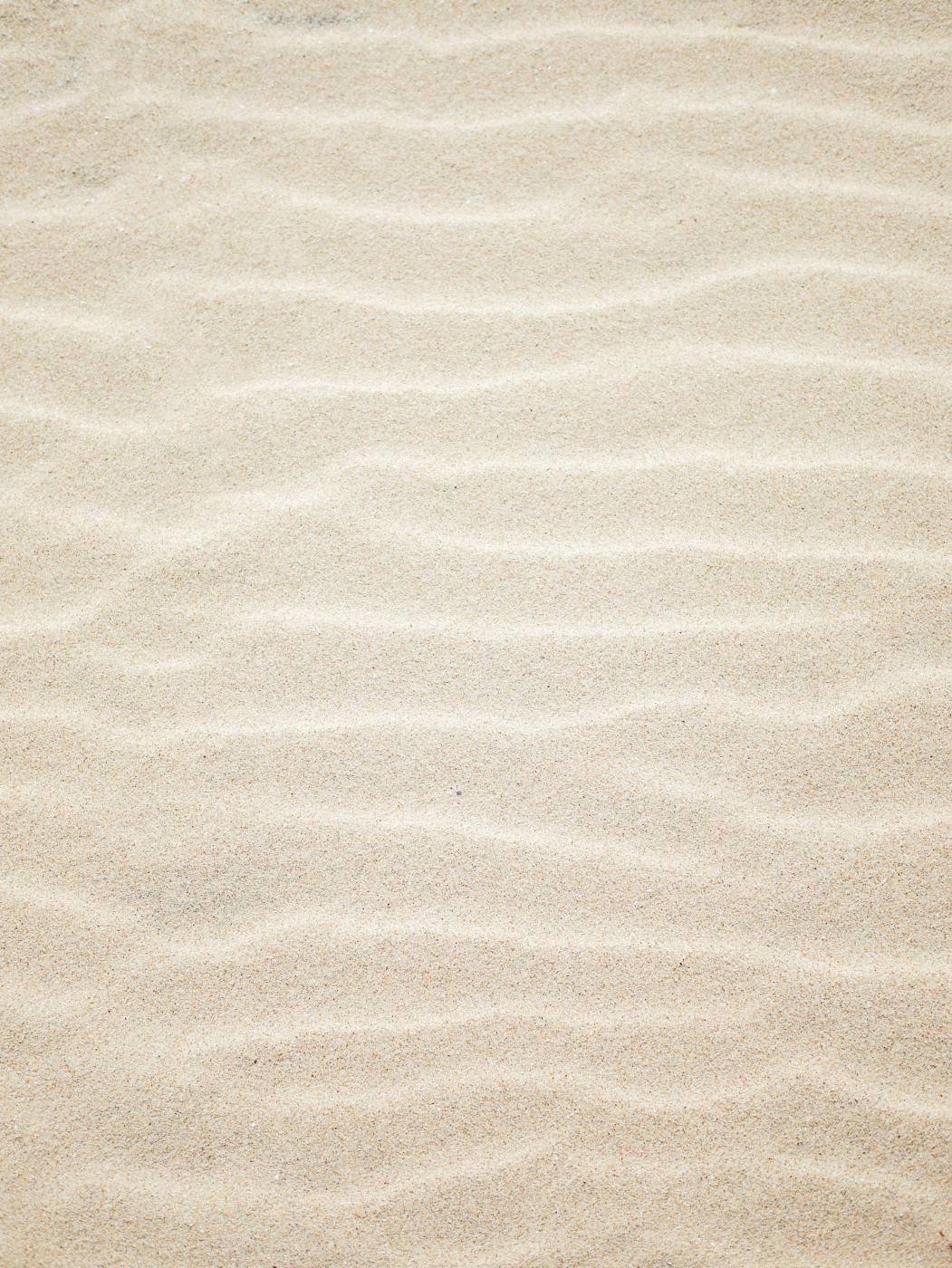  brown sand with shadow of person  picture