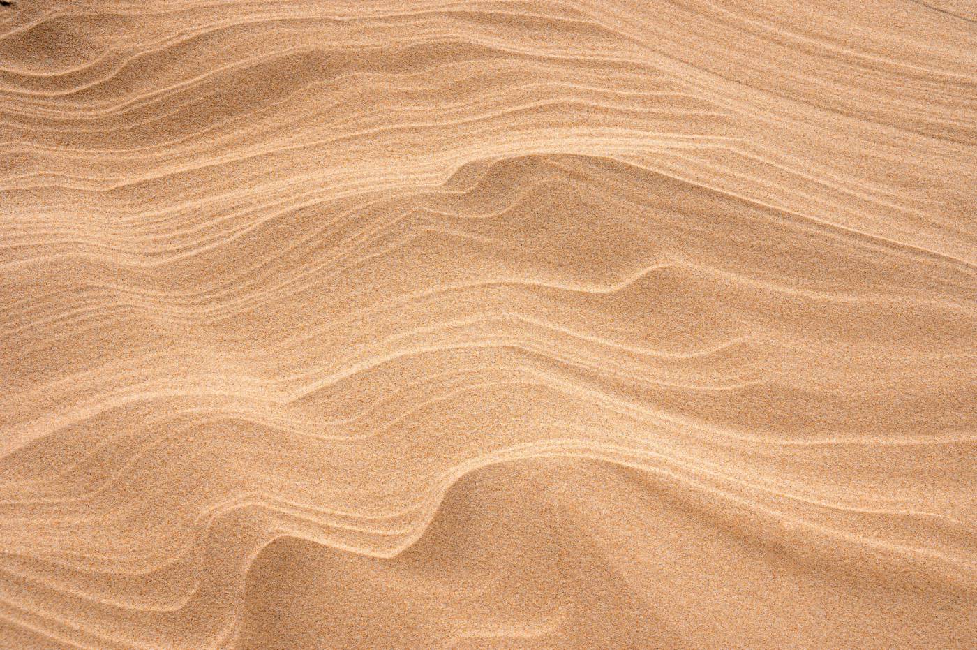 texture brown sand with shadow of person  picture
