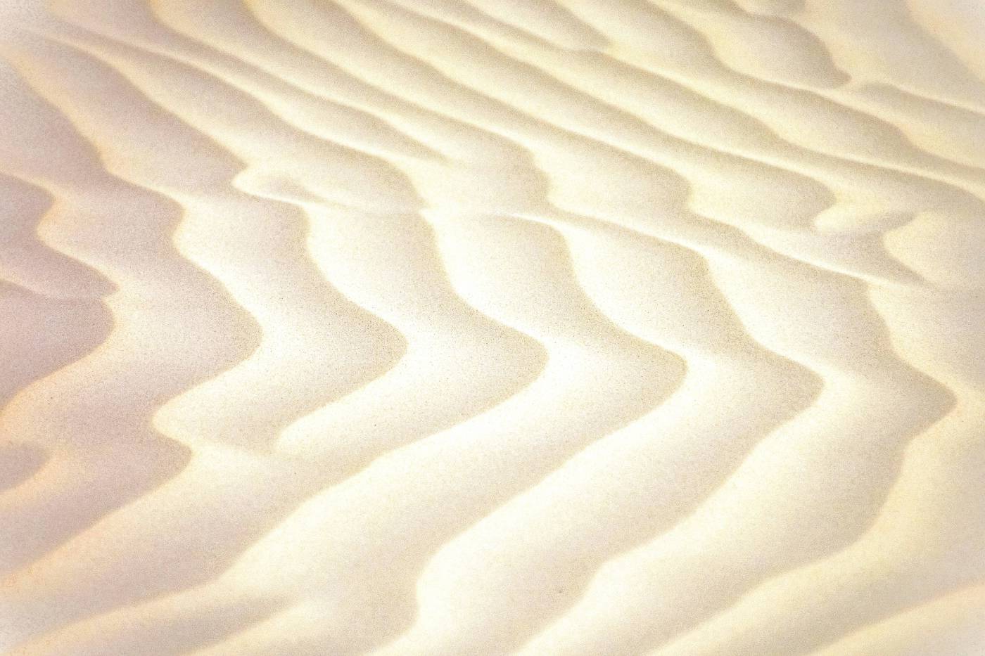  white sand with shadow of person  picture