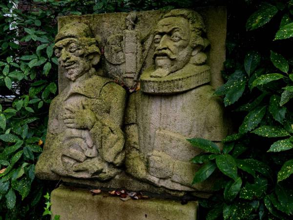 netherlands a statue of two men sitting next to each other stone texture