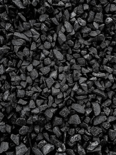 pattern a black and white photo of a pile of rocks mobile photography