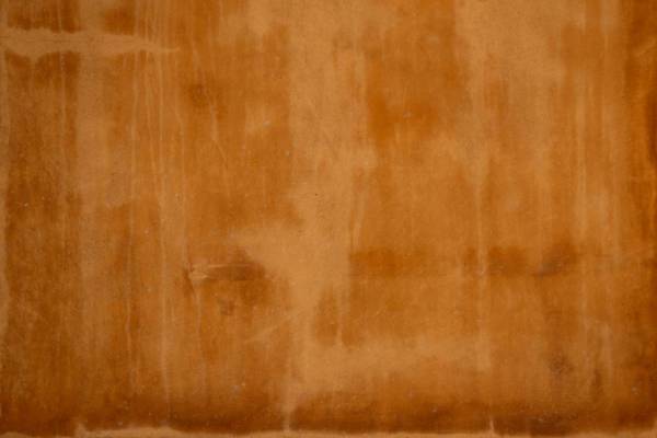 brown brown wooden floor with white textile 