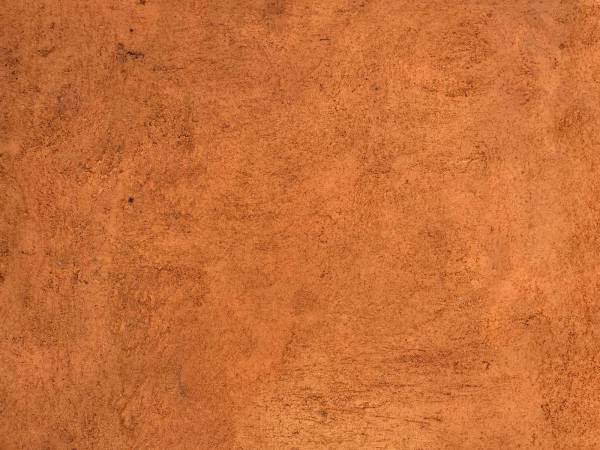 color person in black shoes standing on brown floor orange