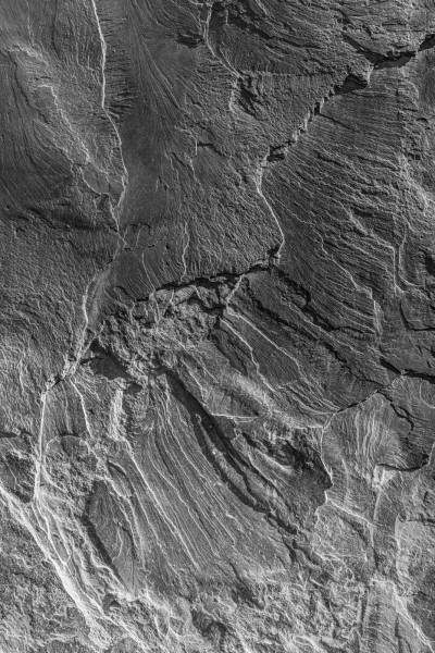 grey grayscale photo of rock formation 