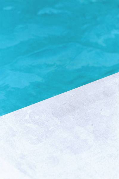 pattern empty gray floor beside pool blue