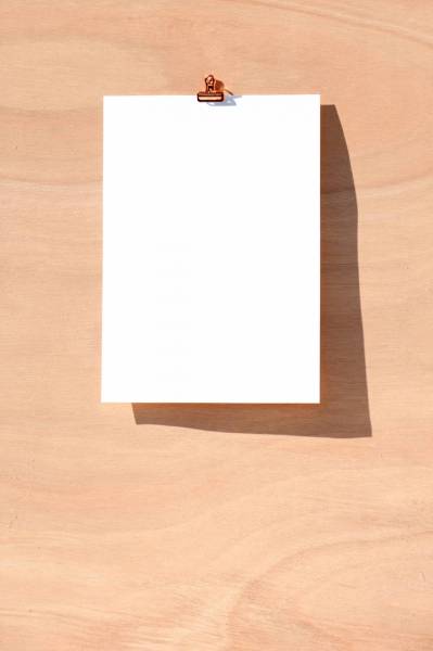 pattern white printer paper on brown wooden table paris
