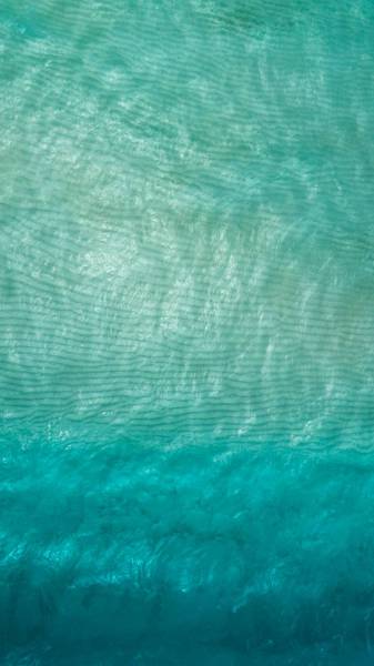 water close up photo of green cloth texture