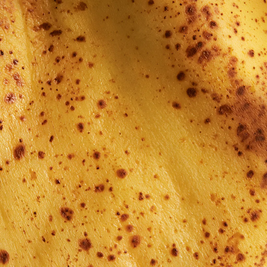 banana texture banana peel with irregular brown freckles soft