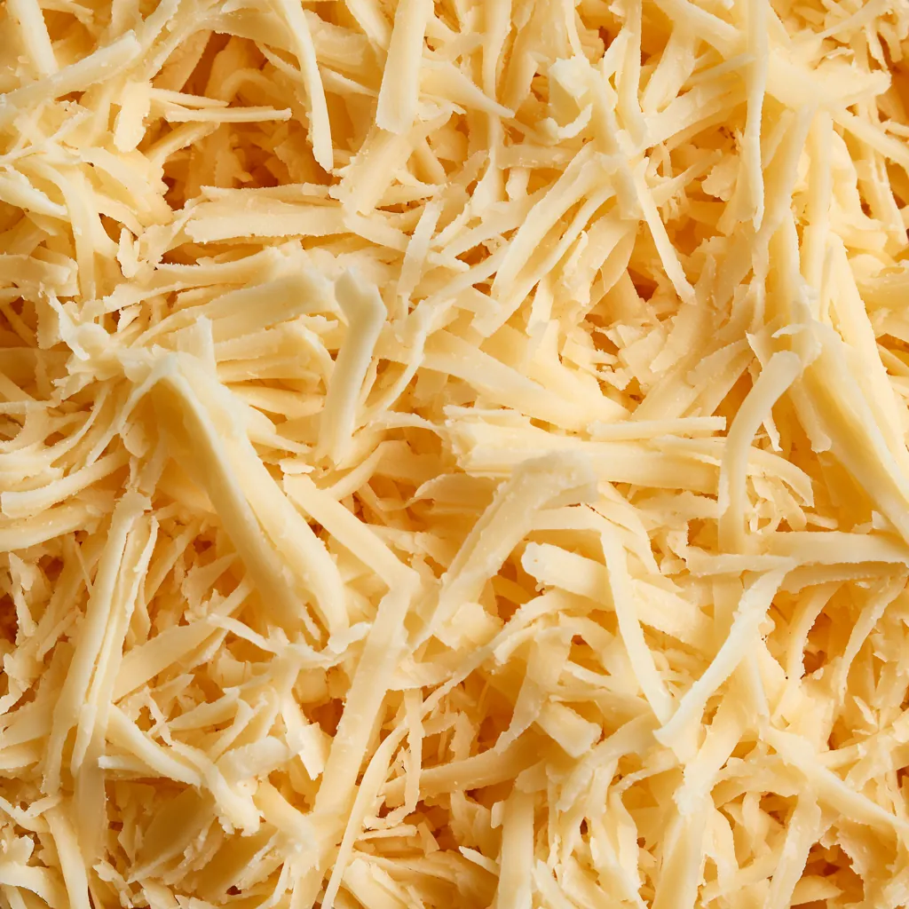 cheese texture grated cheese macro overlapping fine strands