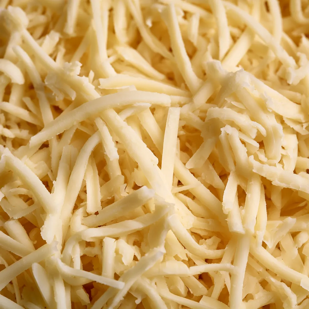 cheese texture grated cheese macro overlapping fine strands